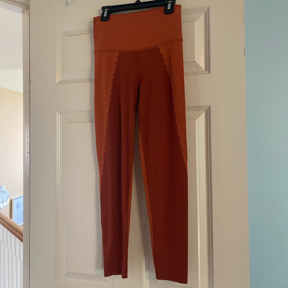 Aerie size M orange leggings with design